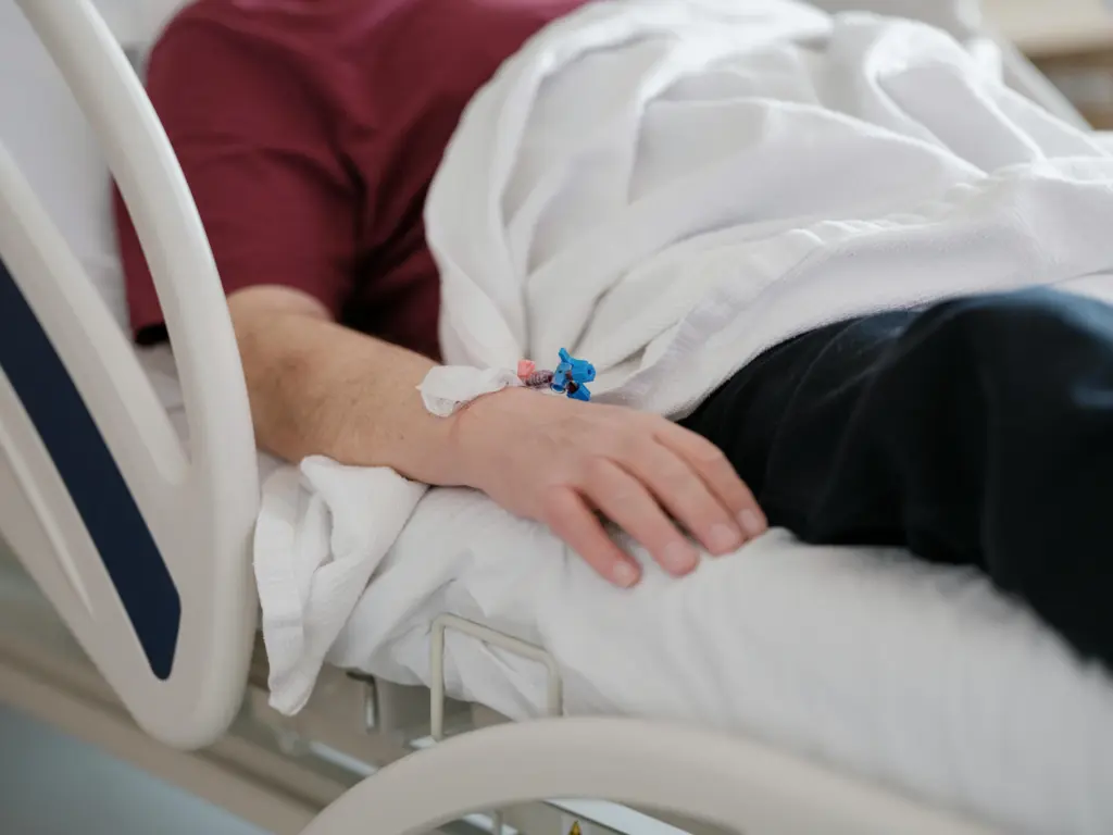 Man In Hospital Bed Because Of Involuntary Commitment